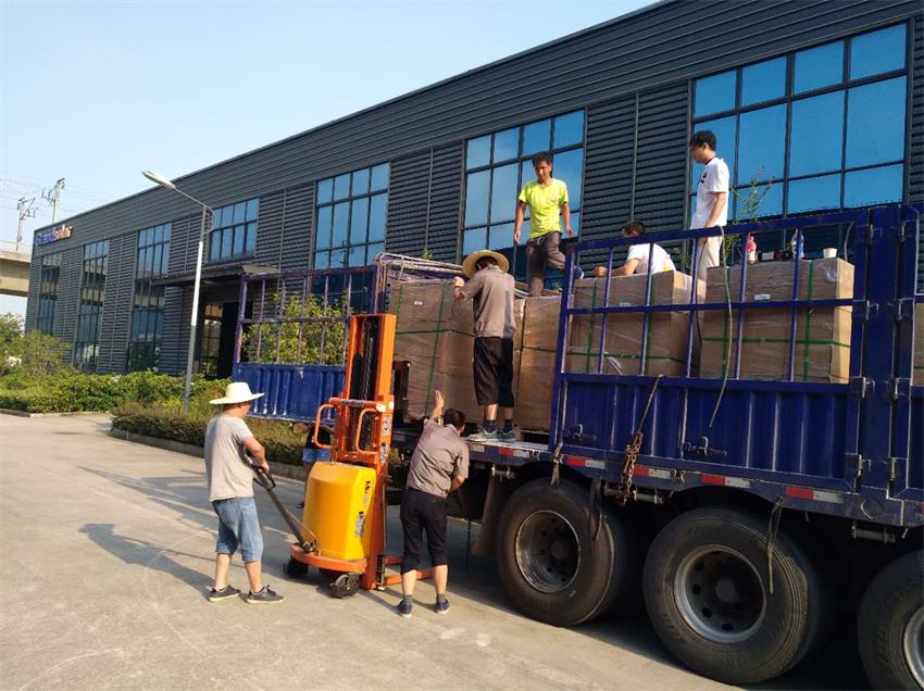 烈日炎炎出货忙 同心协力保交期